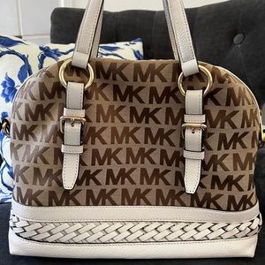 Michael Kors canvas and pebble grain leather satchel.